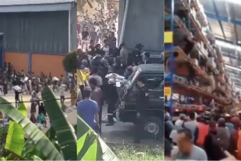 印尼居民在洪灾中为生存哄抢食物和水