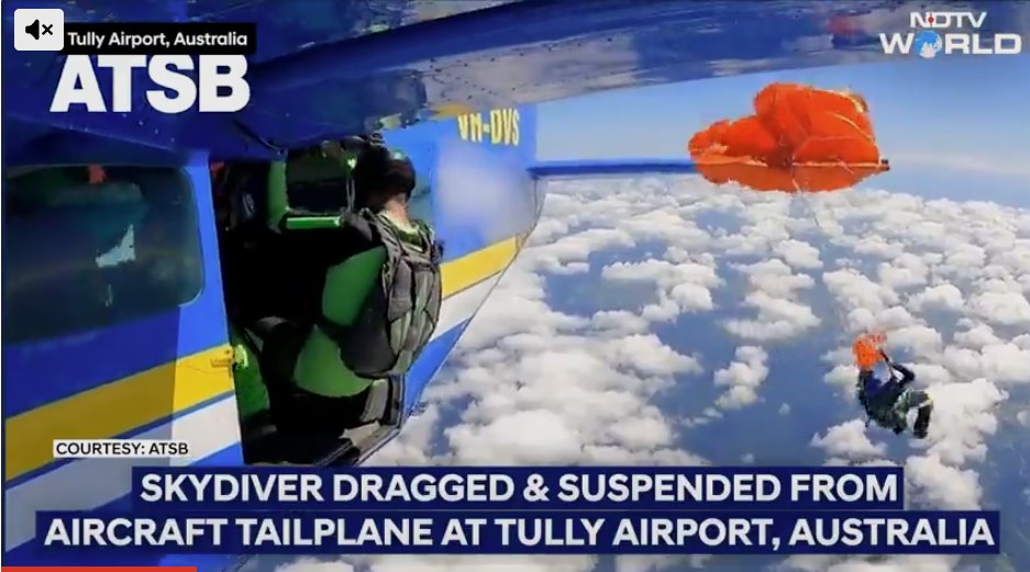 跳伞者被向后抛出,双腿撞到了飞机尾翼。